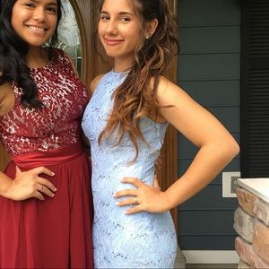 A elegant prom dress with pearl buttons down back